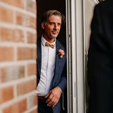 man wearing cork bow tie with silver bling for wedding