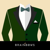 dark green suit and blue bow tie