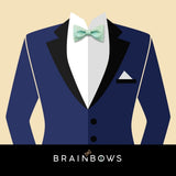 navy blue suit and mint bow tie
