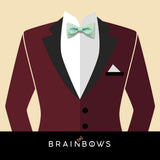 mint bow tie and dark red suit