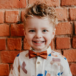 cute boy wearing cork bow tie