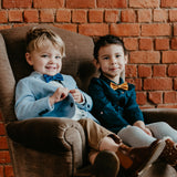 boy and girl wearing cork bow ties