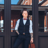 business man wearing dark red bow tie