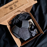 black recycled braces with cork fabric in a burger box