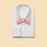 pink cork bow tie on a white dress shirt
