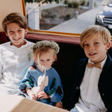 young boy wearing cork bow tie for a wedding