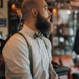 man wearing green suspenders