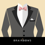 grey suit with pink bow tie