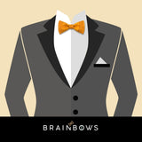 gray suit and yellow bow tie