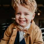 boy with natural cork bow tie