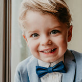 cute boy with blue cork bow tie