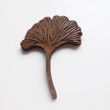 wooden brooch or boutonniere with ginkgo leaf