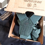 burger box with dark green suspenders made from recycled jeans