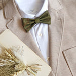 khaki green bow tie with beige blazer