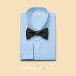 black cork bow tie on a light blue dress shirt