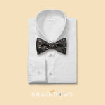 black and gold cork bow tie on a white dress shirt