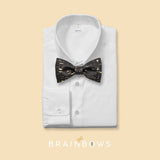 black and gold cork bow tie on a white dress shirt