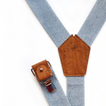 detail of braces made from recycled denim and cork fabric