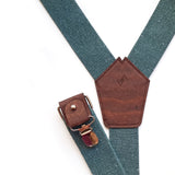 detail of suspenders made from recycled denim and cork 